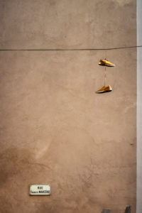 Hanging sneakers in Narbonne Hanging sneakers in Narbonne